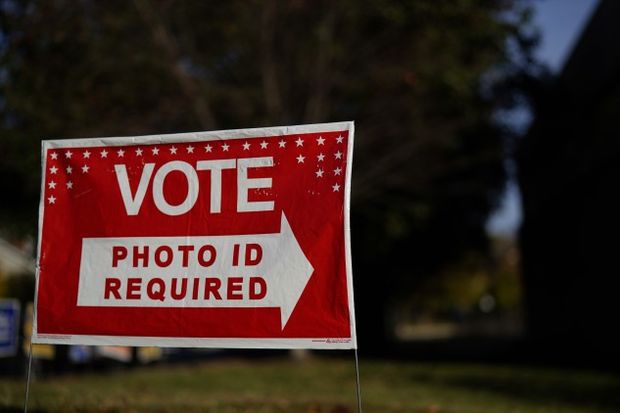 Photo ID required voting sign