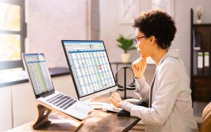 Woman reviewing spreadsheets
