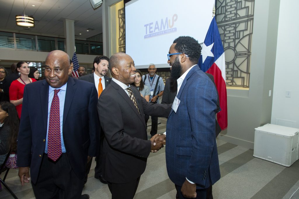 Houston Mayor Sylvester Turner and Niiobli Armah IV of Bloomberg Associates at a TeamUp celebration in May 2019.