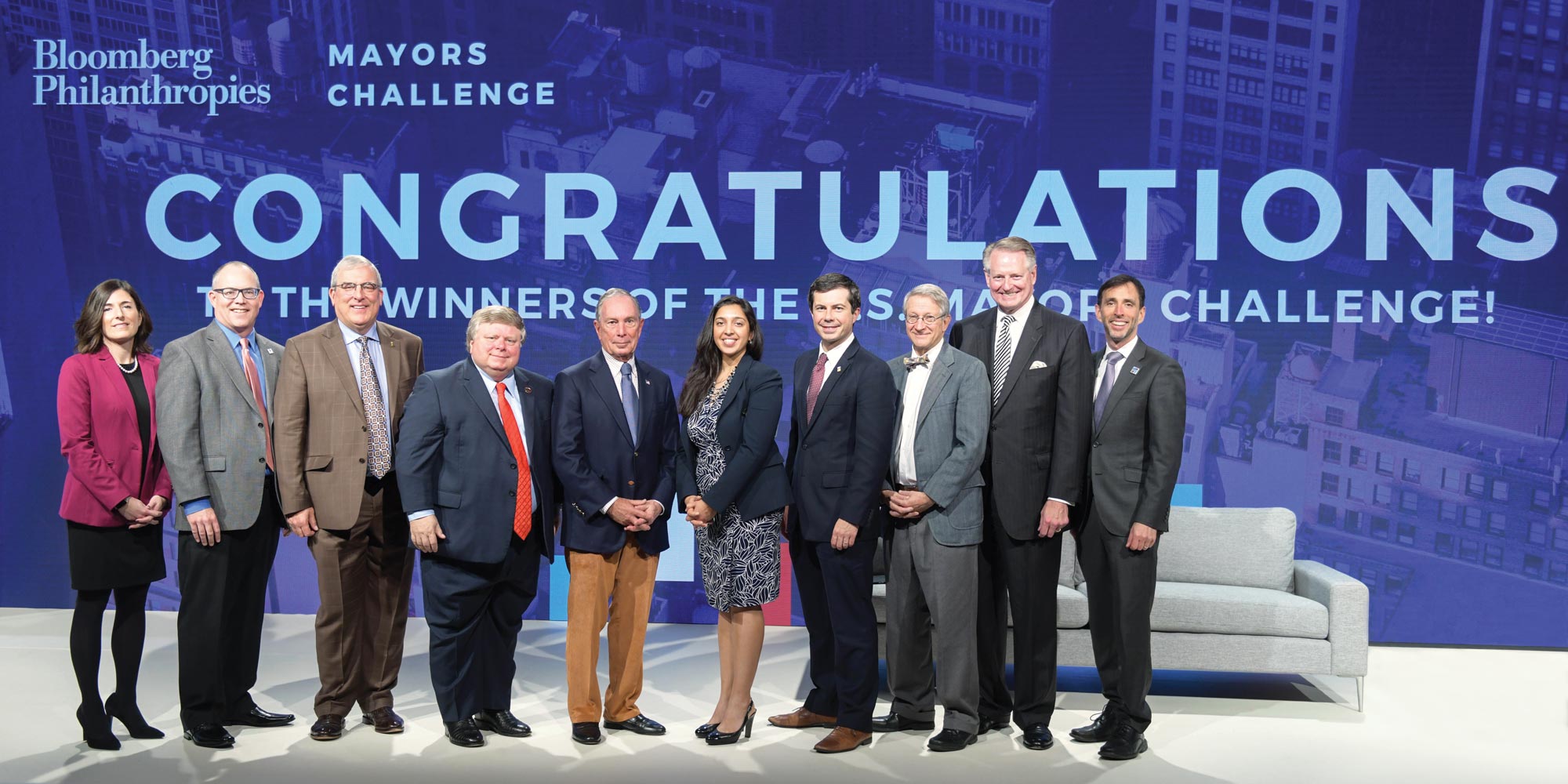 Mayors and representatives of the winning cities in the 2018 Mayors Challenge join Mike Bloomberg onstage at CityLab 2018 in Detroit, Michigan.