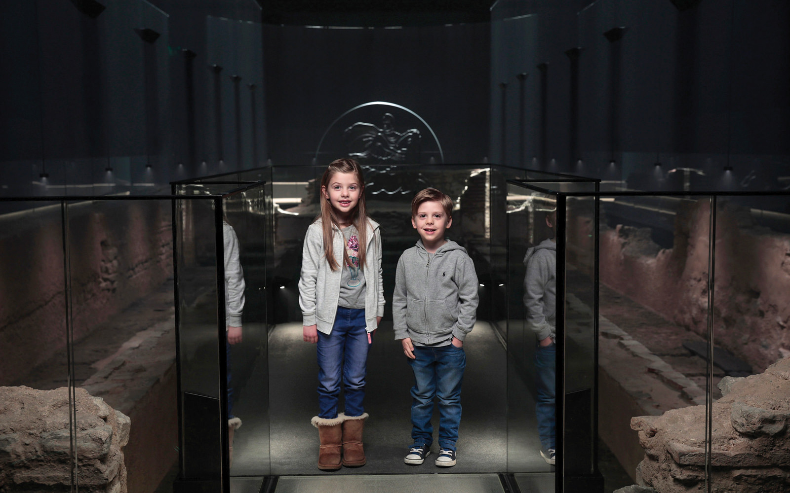 Children exploring the London Mithraeum at Bloomberg L.P.‘s European headquarters.