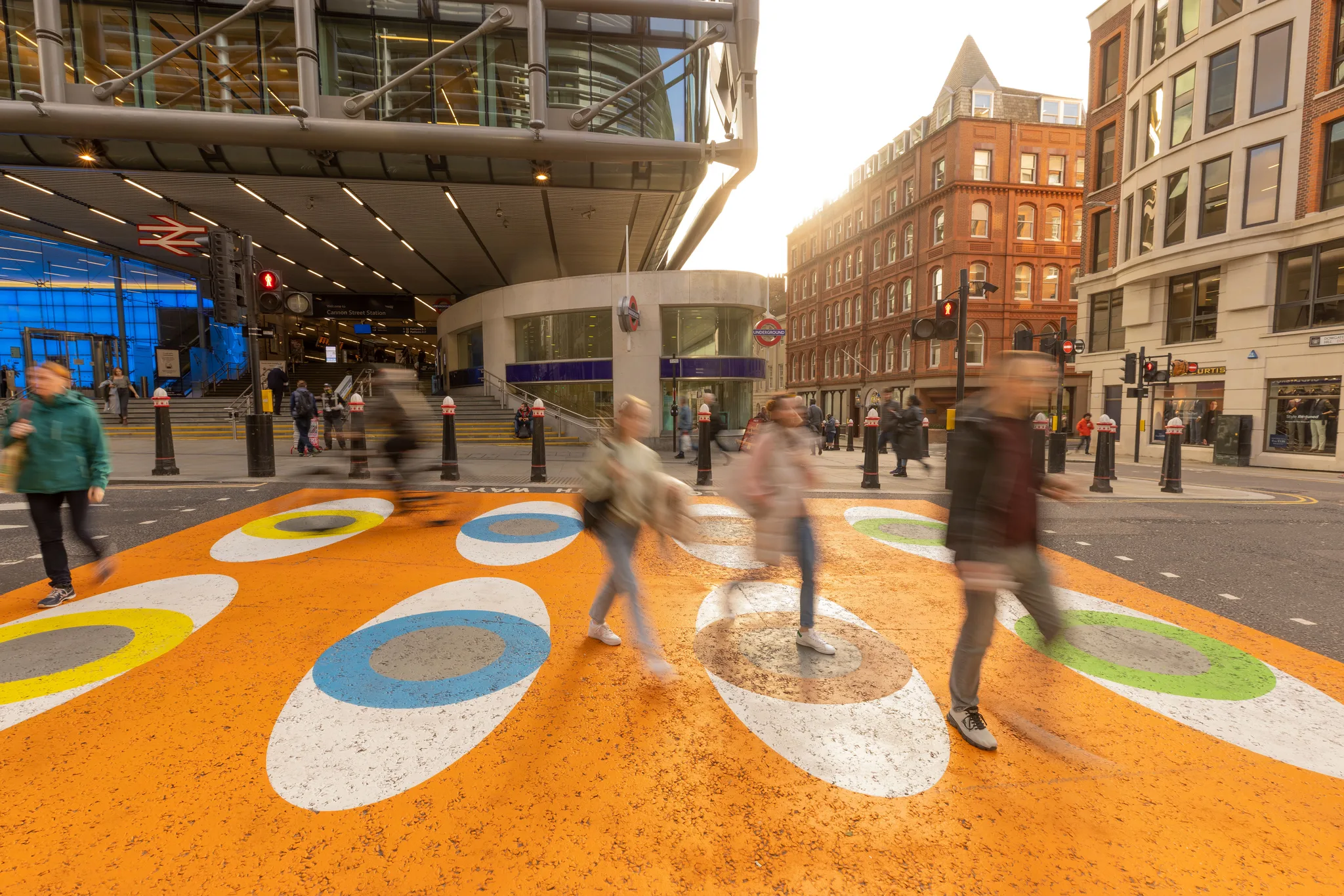 Asphalt art installation with painted cross way in front of Cannon Street Station in London, England