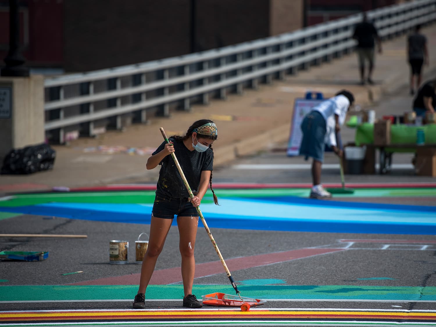 Team work for Saginaw asphalt art painting