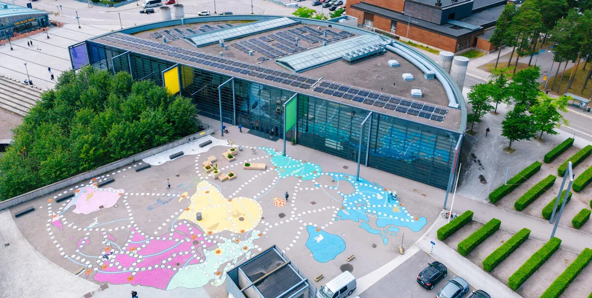 Activating a neighborhood plaza with an artful game - Helsinki, Finland