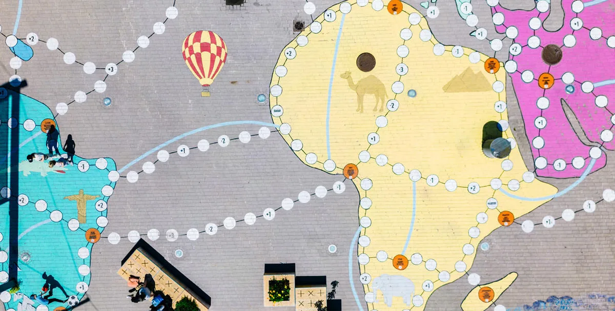 Activating a neighborhood plaza with an artful game - Helsinki, Finland