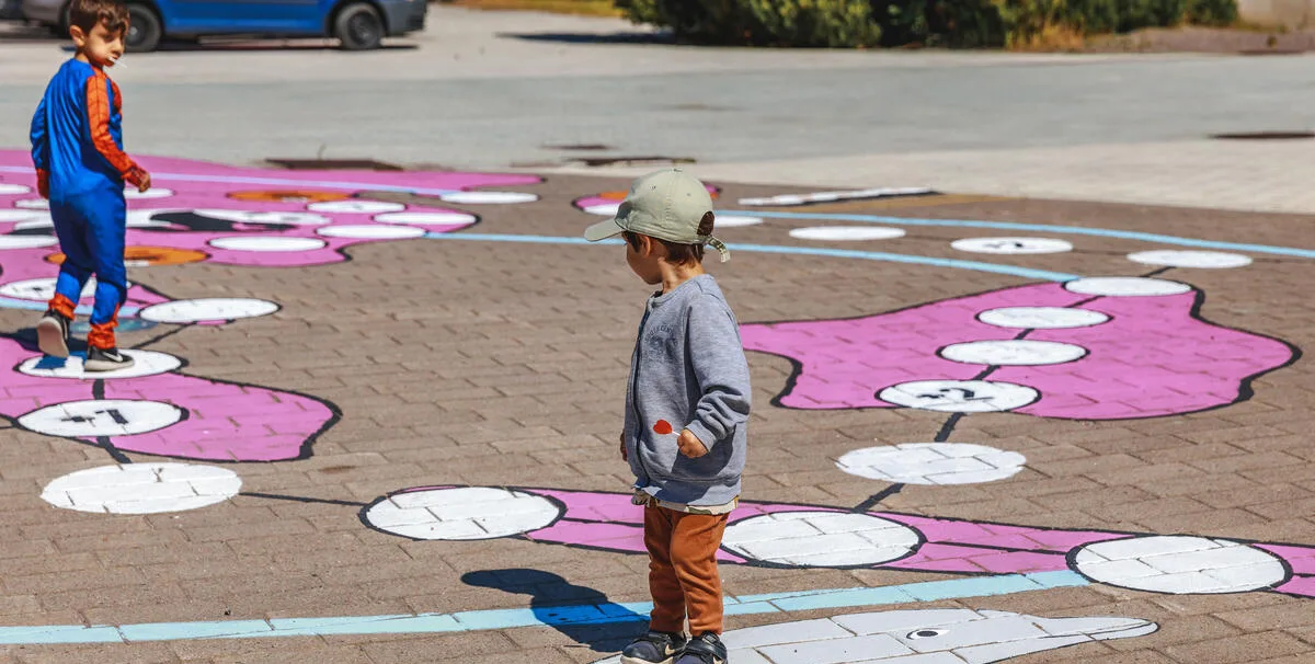 Activating a neighborhood plaza with an artful game - Helsinki, Finland
