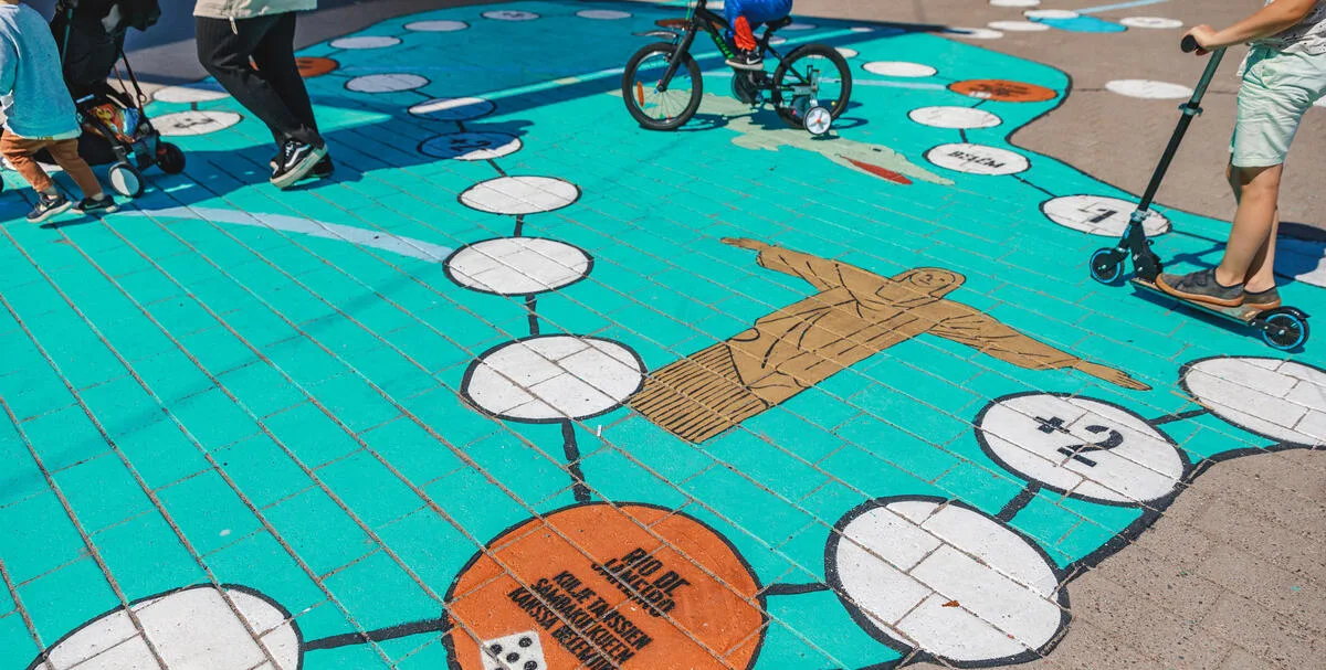Activating a neighborhood plaza with an artful game - Helsinki, Finland