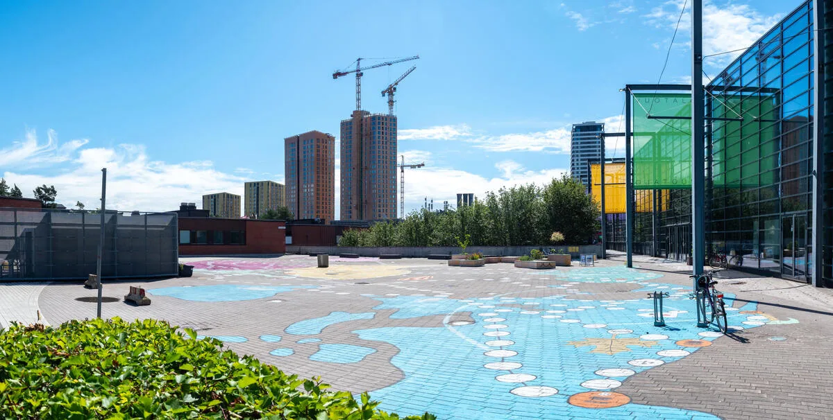 Activating a neighborhood plaza with an artful game - Helsinki, Finland
