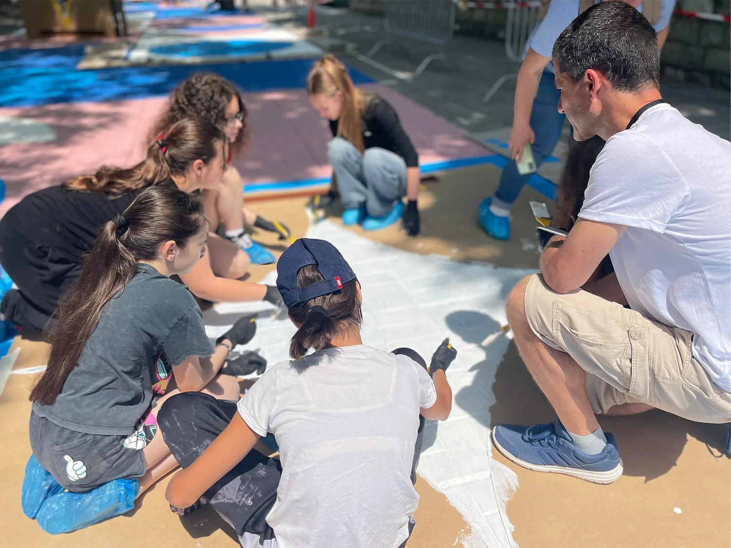 Group of people sitting down together to pain in Varna
