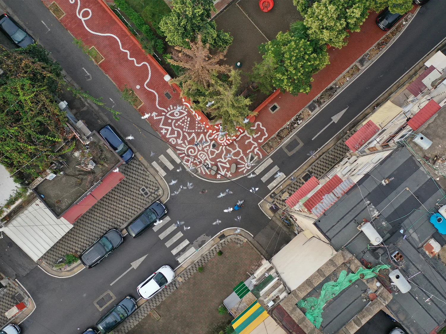 Crossway junction with Asphalt Art project art work in Tirania, Albanaia