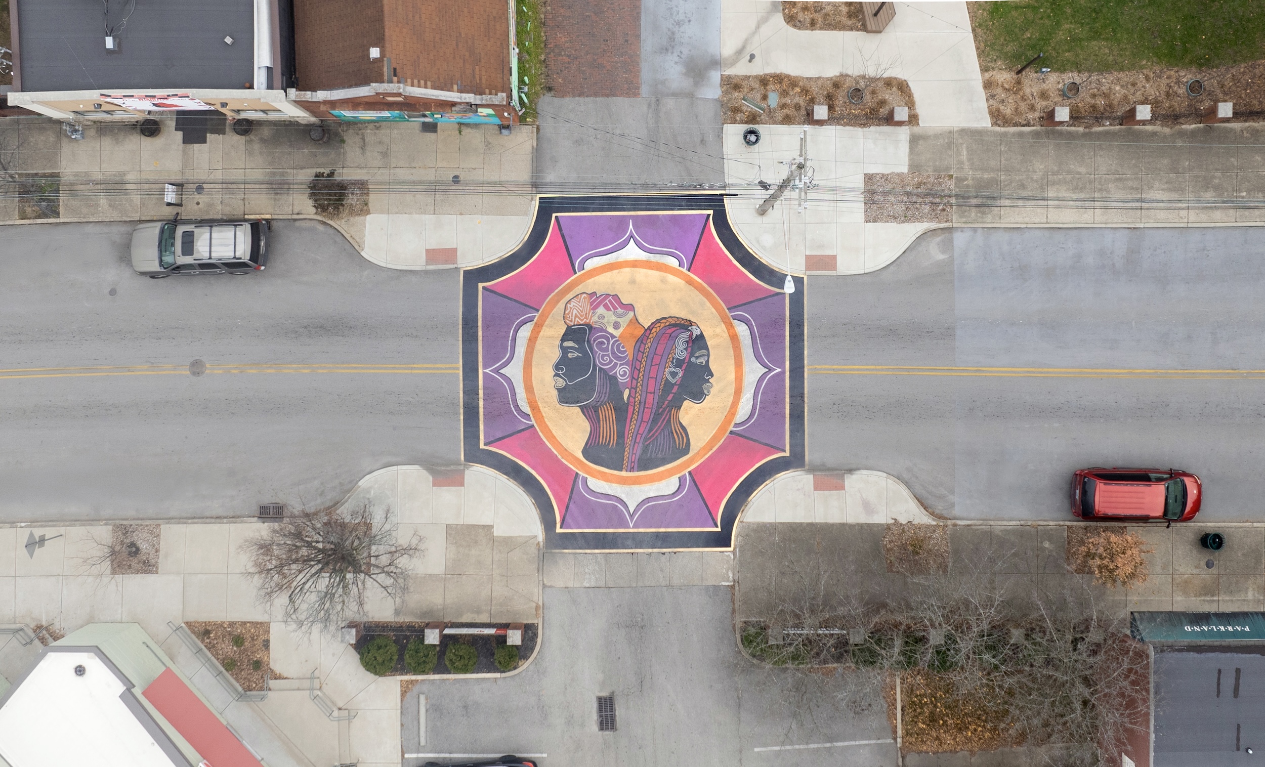 Asphalt Art Initiative before/after comparison photos of Louisville, Kentucky.