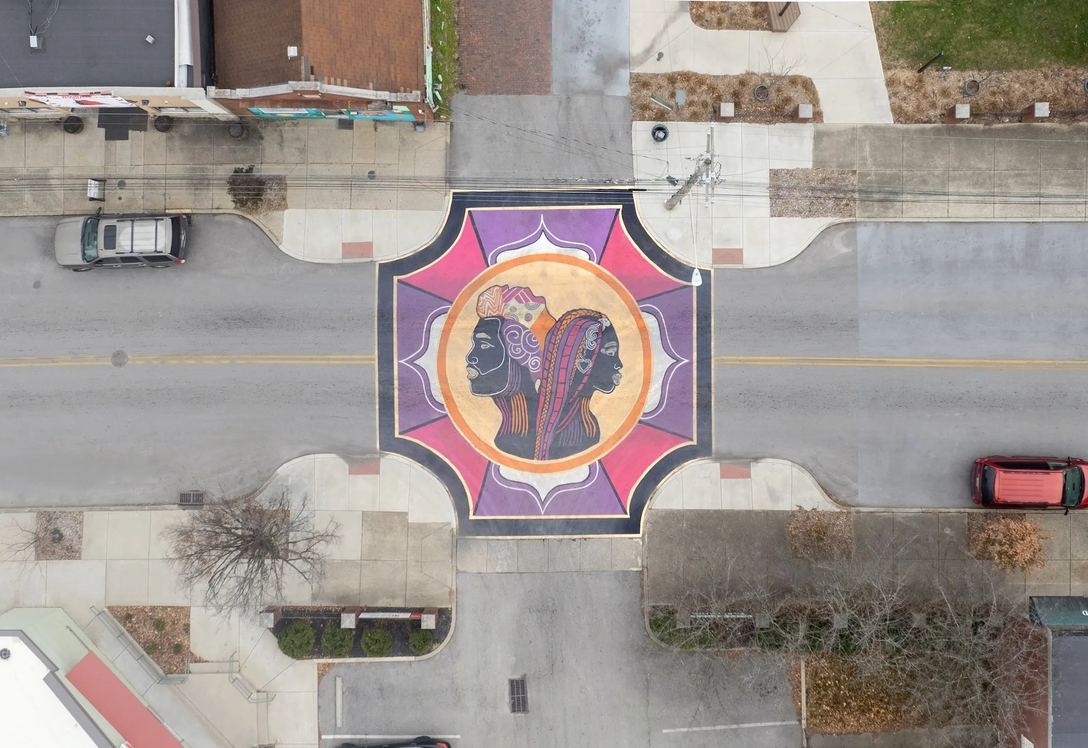 Asphalt Art Initiative before/after comparison photos of Louisville, Kentucky.