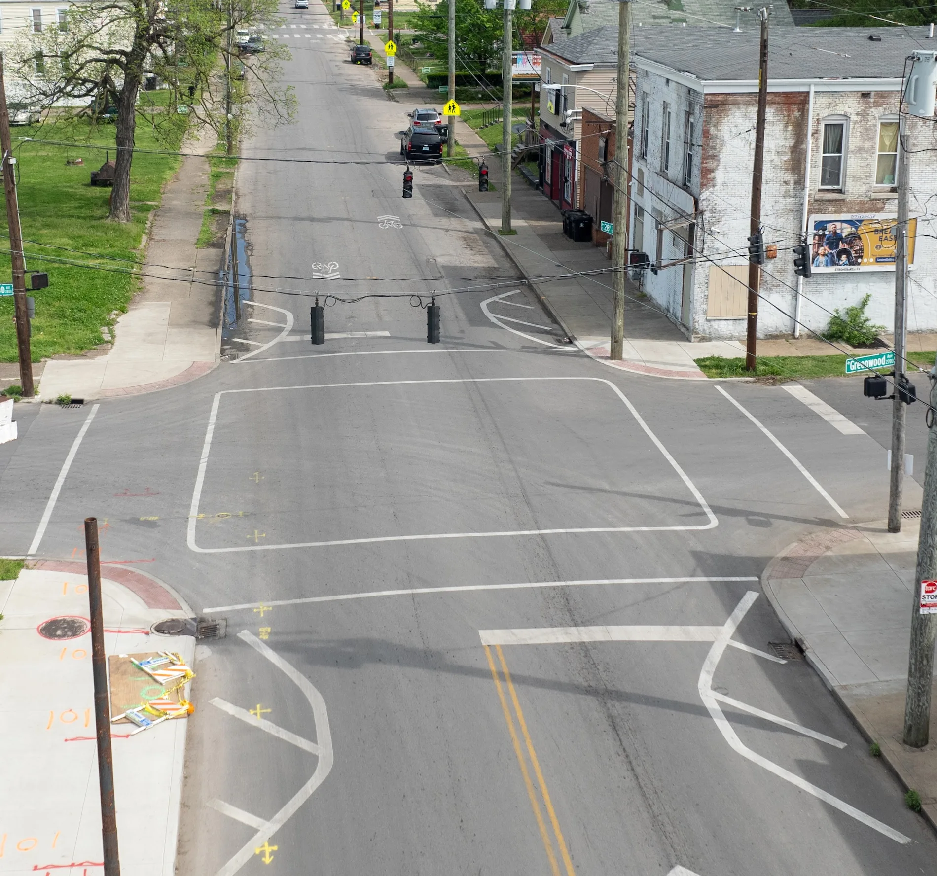 Asphalt Art Initiative before/after comparison photos of Louisville, Kentucky.