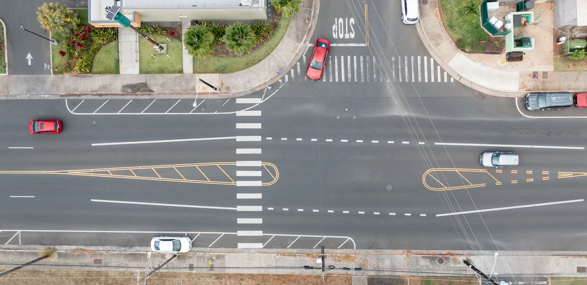 Asphalt Art Initiative before/after comparison photos of Honolulu, Hawaii.