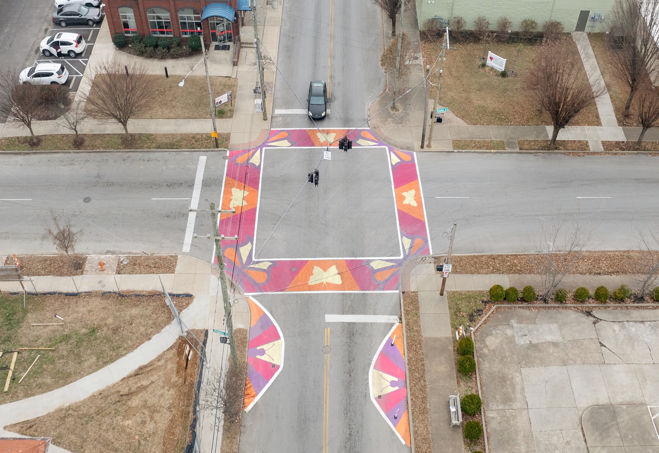 Asphalt Art Initiative before/after comparison photos of Louisville, Kentucky.