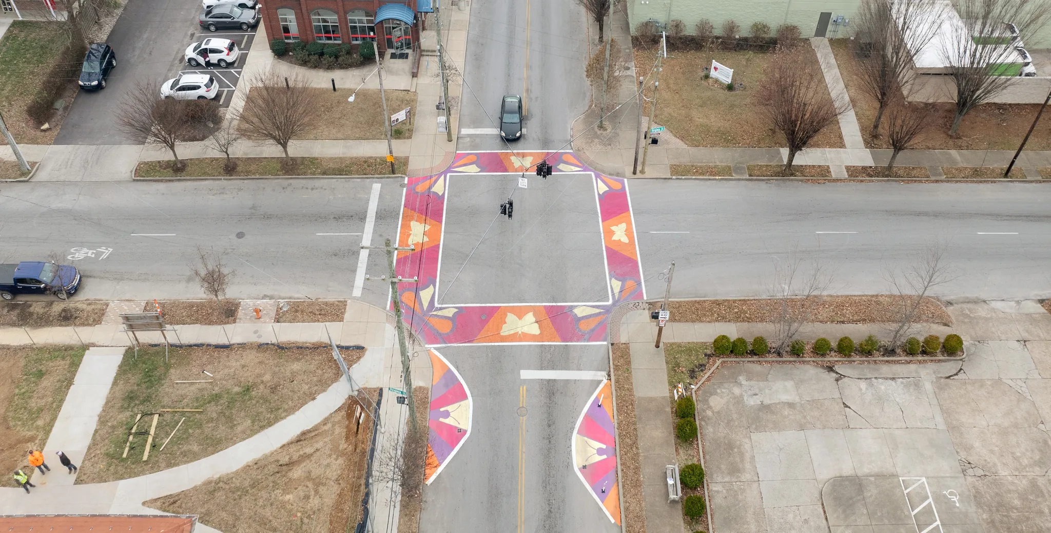 Asphalt Art Initiative before/after comparison photos of Louisville, Kentucky.