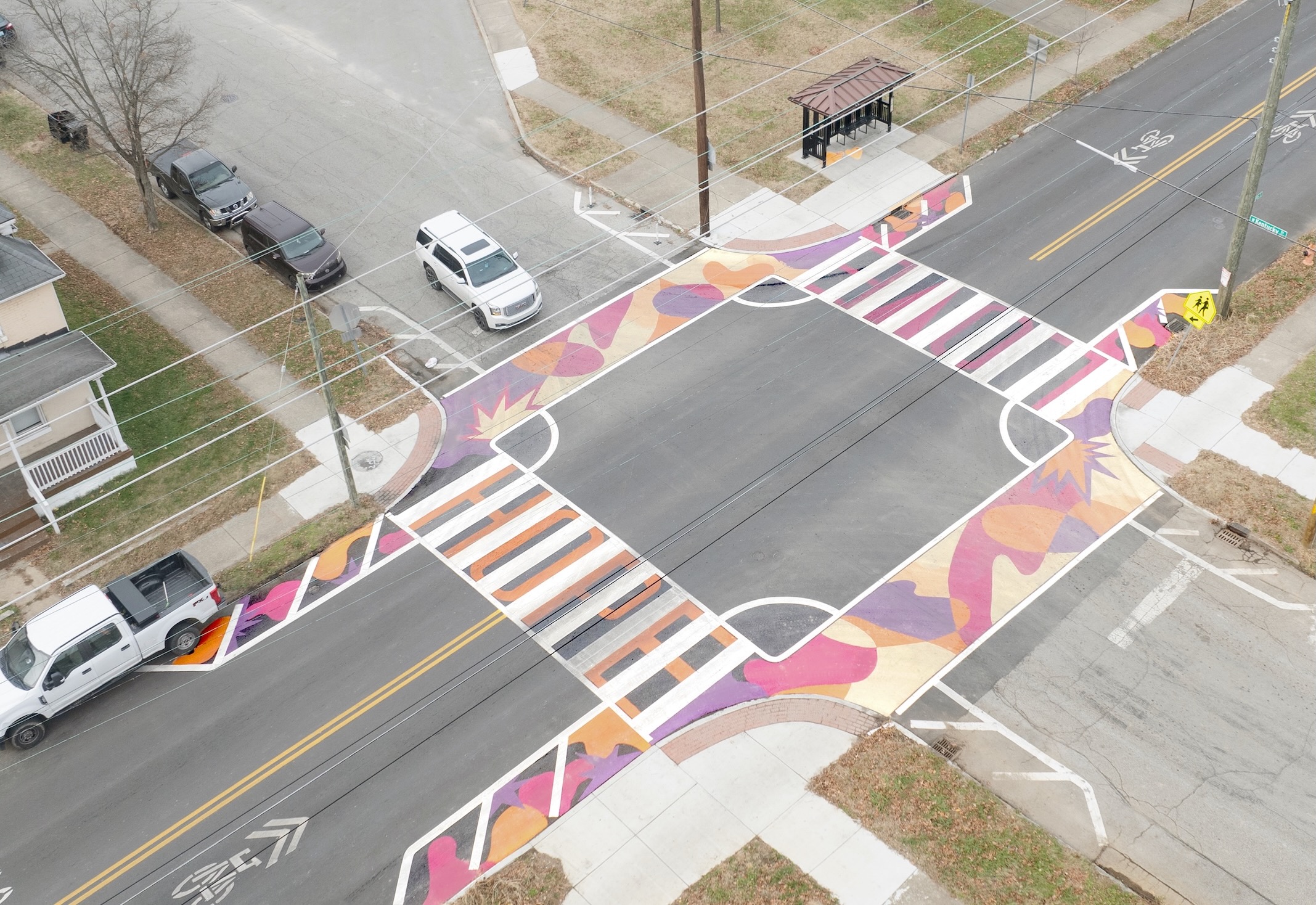 Asphalt Art Initiative before/after comparison photos of Louisville, Kentucky.