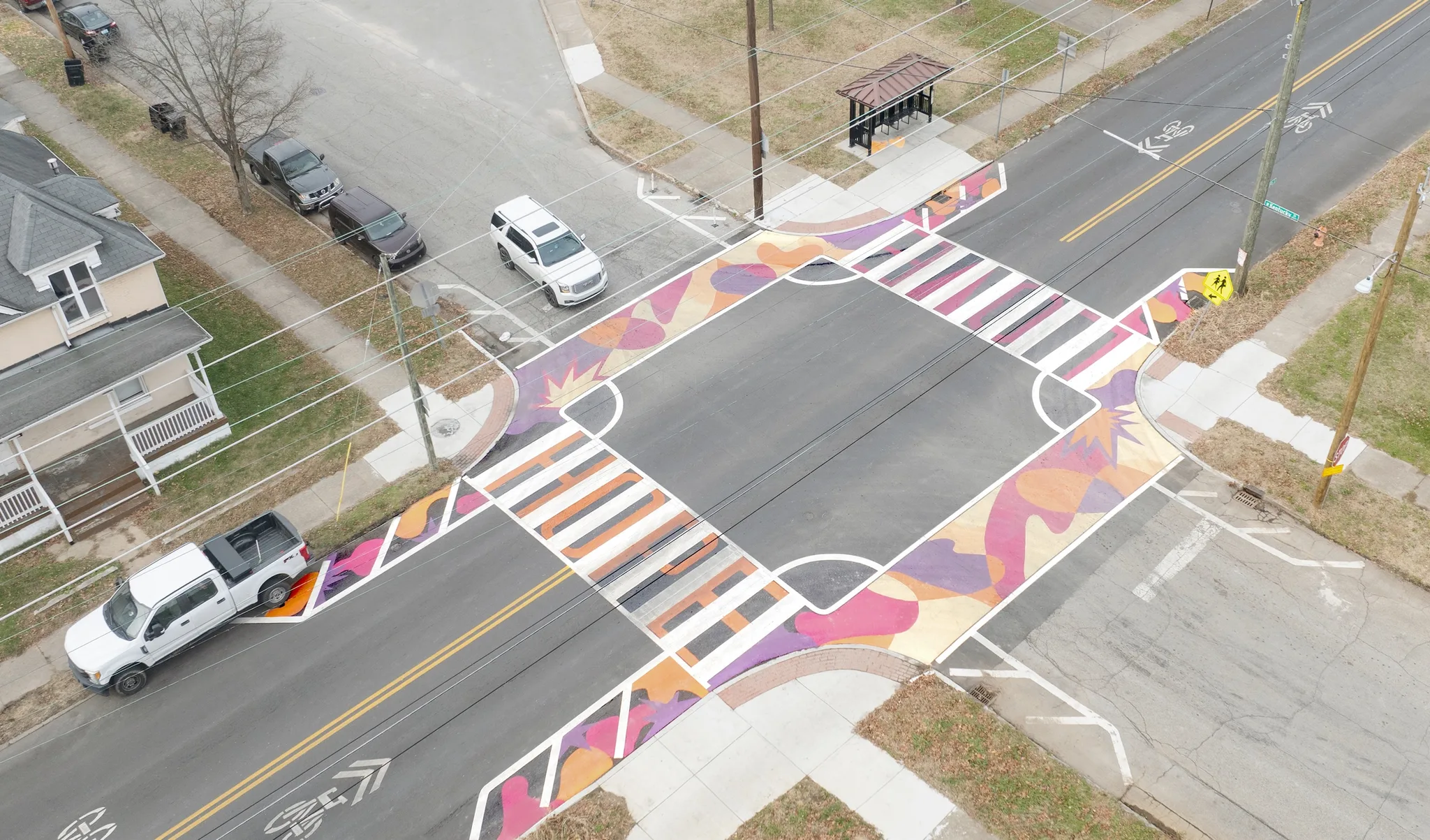 Asphalt Art Initiative before/after comparison photos of Louisville, Kentucky.