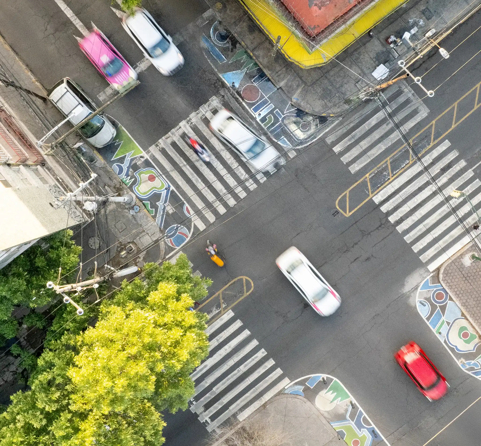 Asphalt Art Initiative “before” and “after” comparison photos in Mexico City.