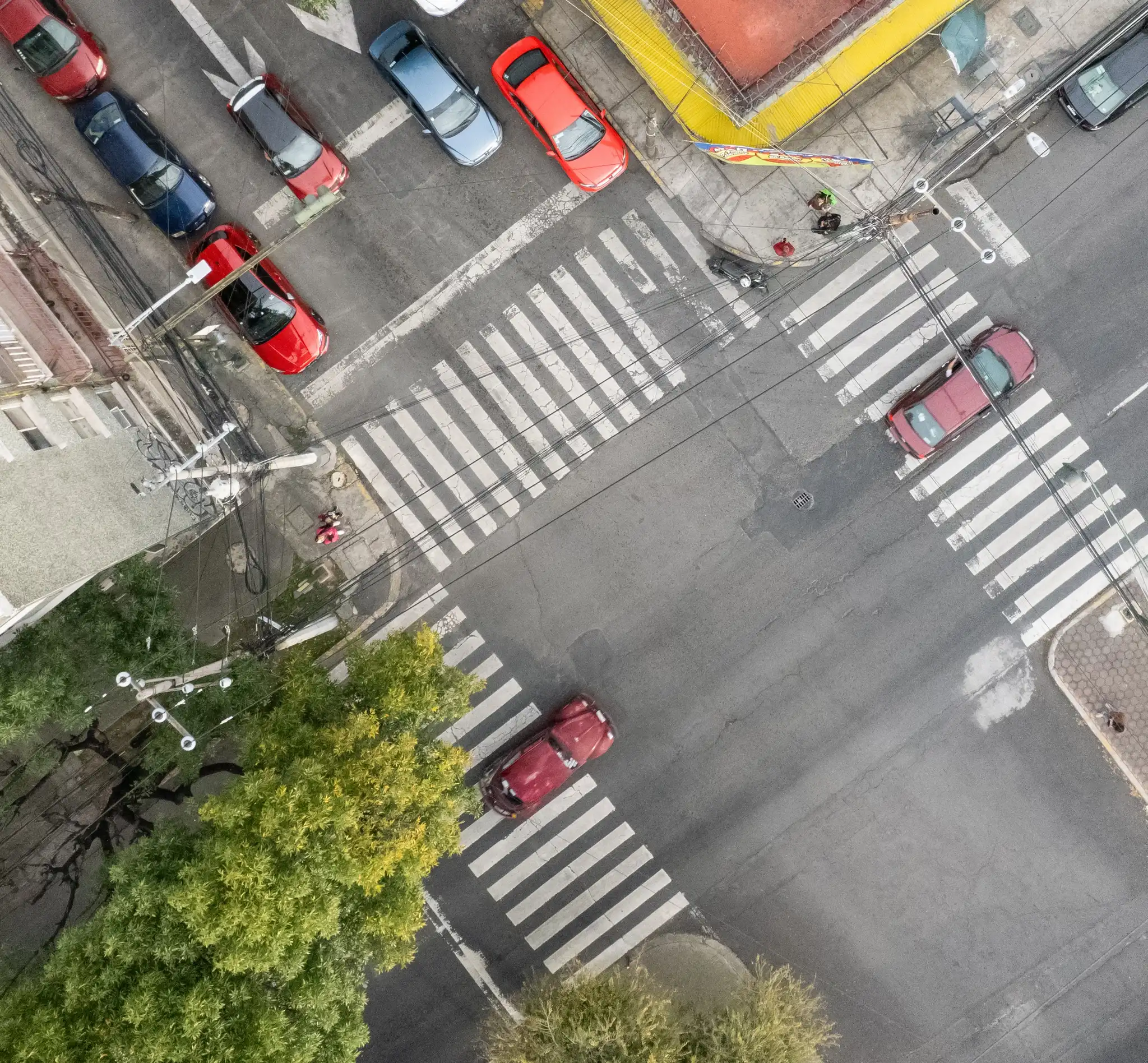 Asphalt Art Initiative “before” and “after” comparison photos in Mexico City.