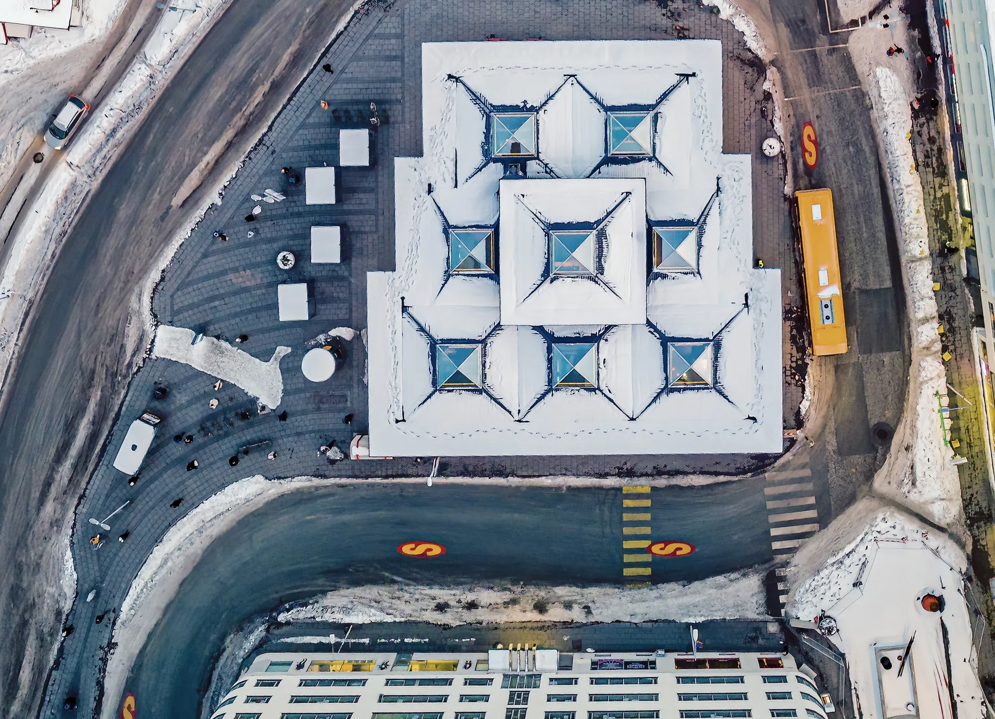Asphalt Art Initiative before and after comparison photos in Reykjavik, Iceland.