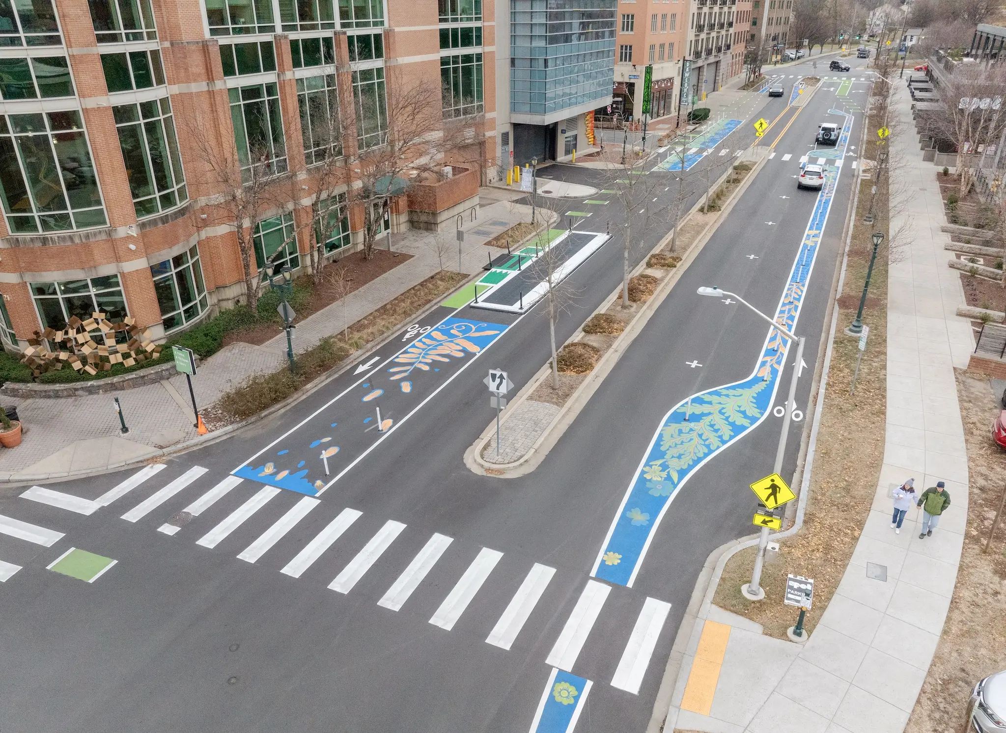 Asphalt Art Initiative before/after comparison photos of Rockville, Maryland.