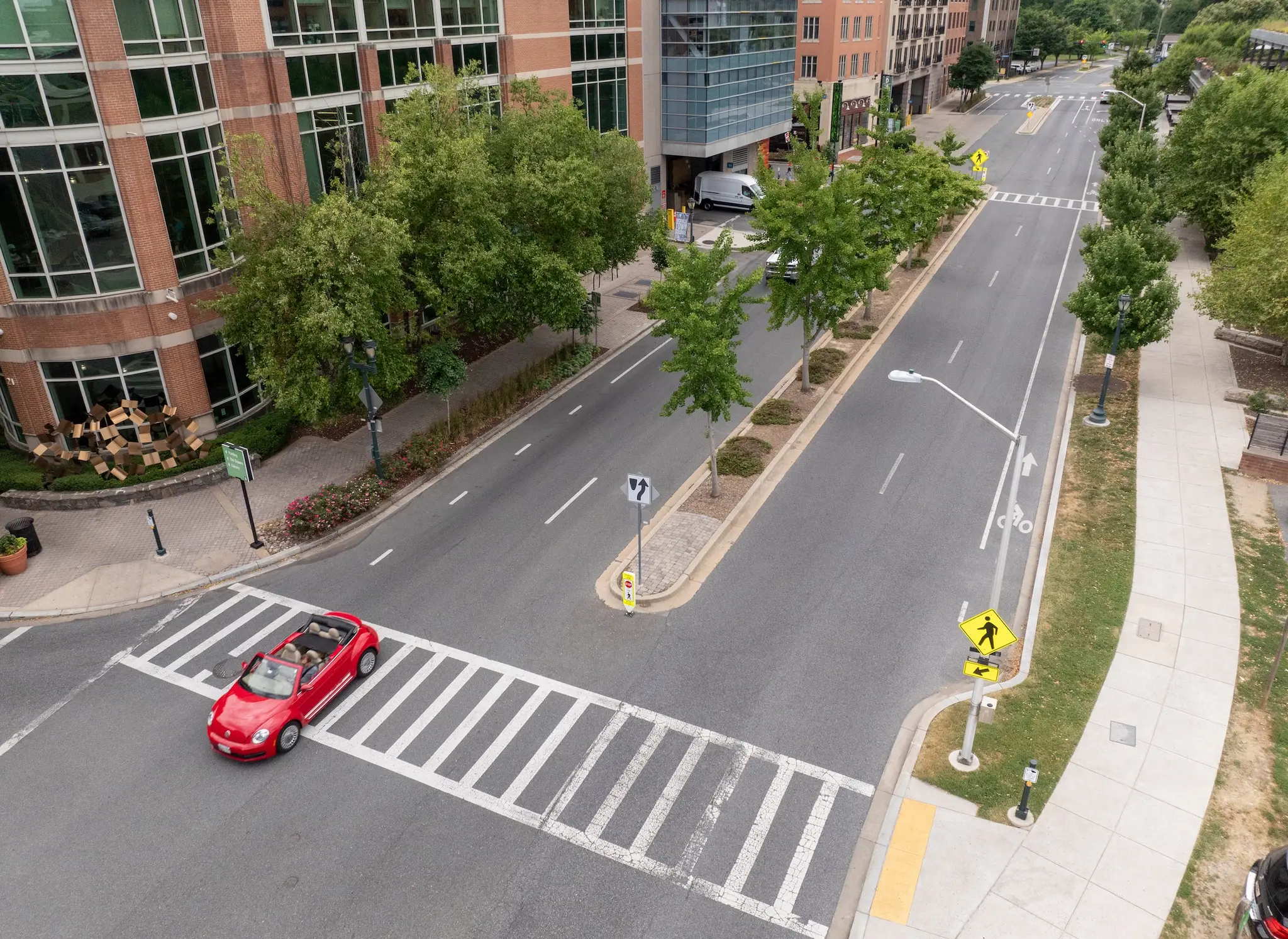 Asphalt Art Initiative before/after comparison photos of Rockville, Maryland.