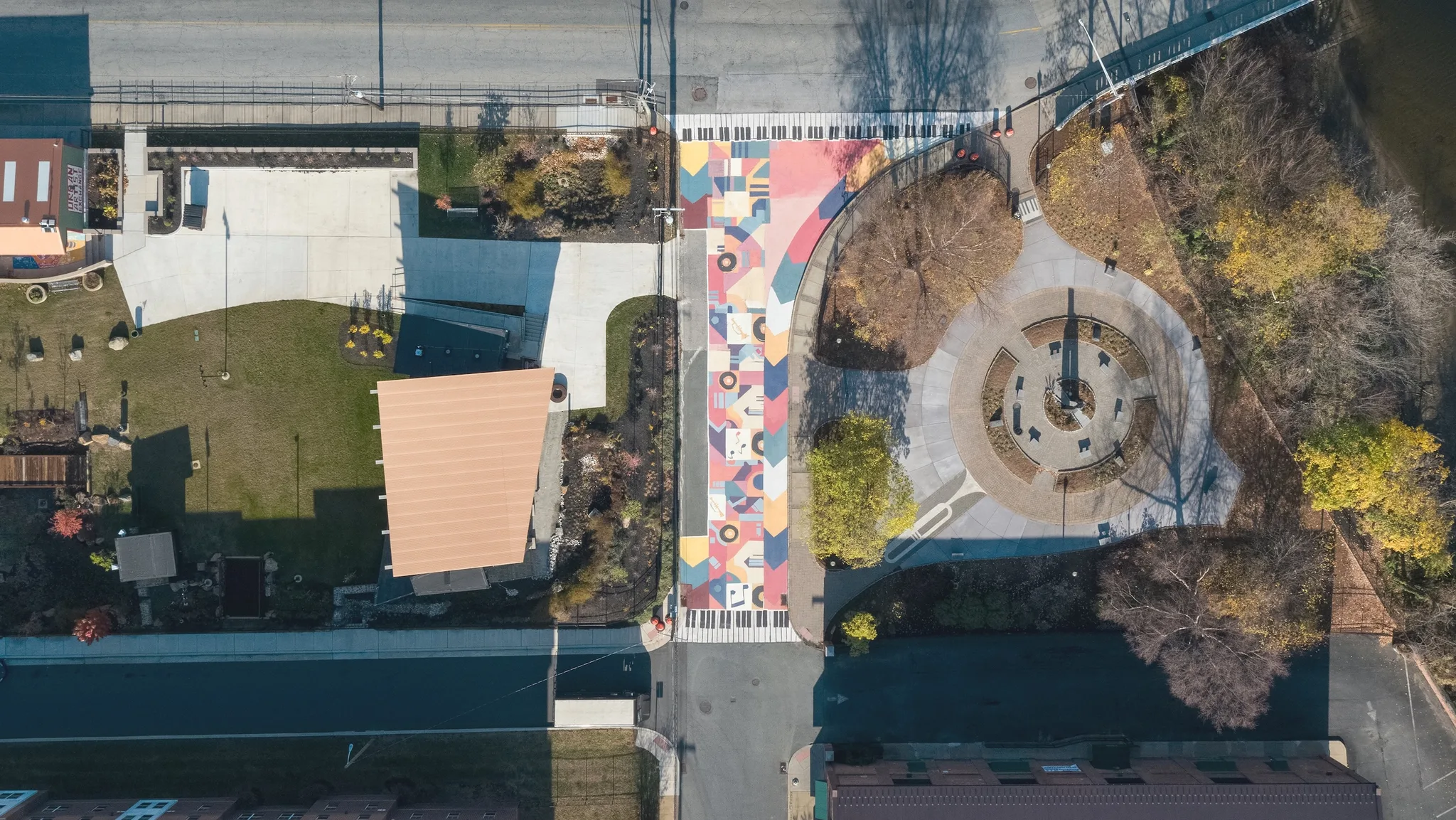 Asphalt Art Initiative before/after comparison photos of Wilmington, Delaware.