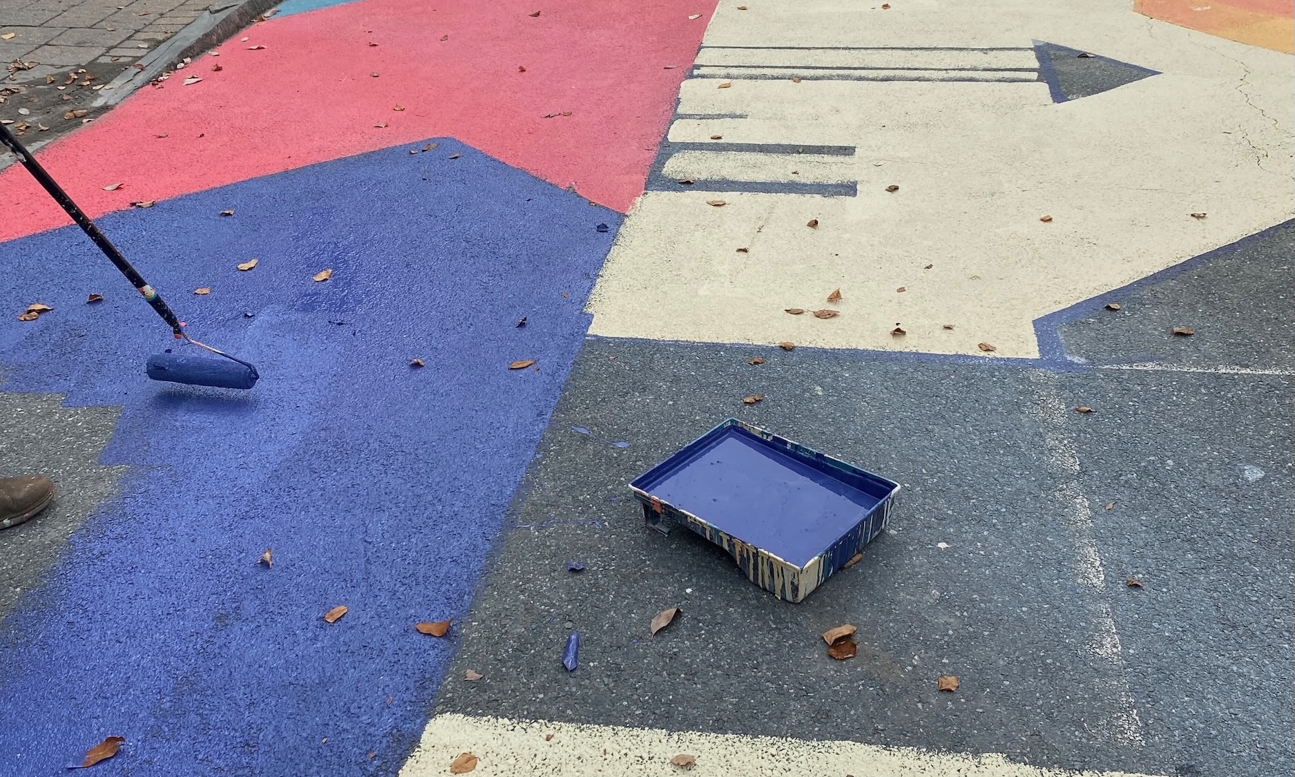 Asphalt Art Initiative before/after comparison photos of Wilmington, Delaware.