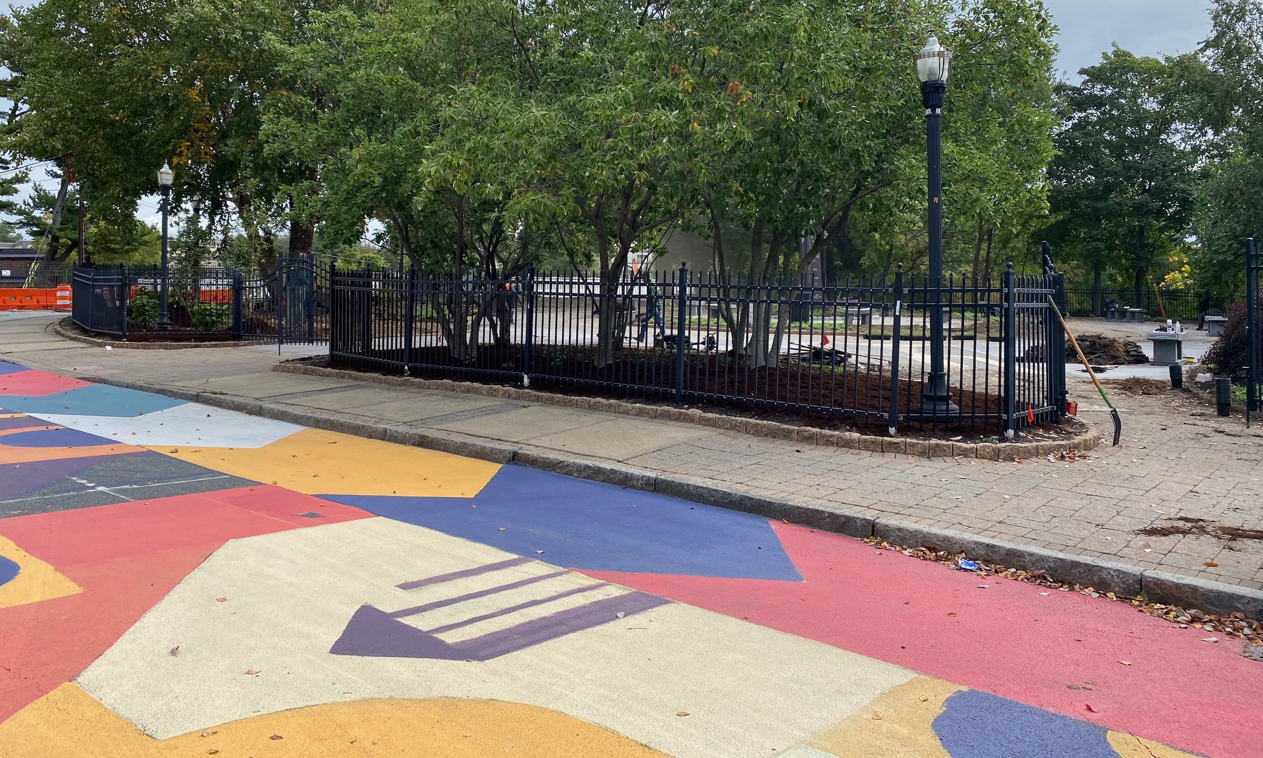 Asphalt Art Initiative before/after comparison photos of Wilmington, Delaware.