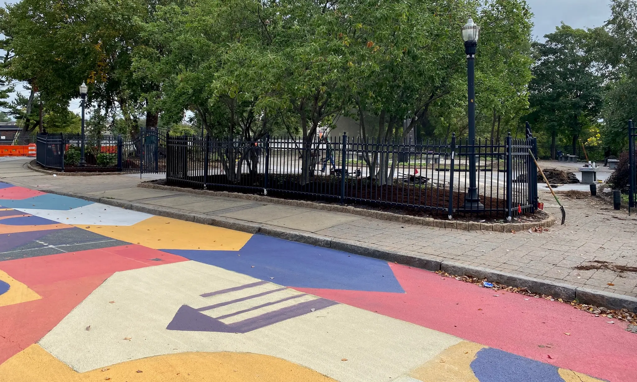 Asphalt Art Initiative before/after comparison photos of Wilmington, Delaware.