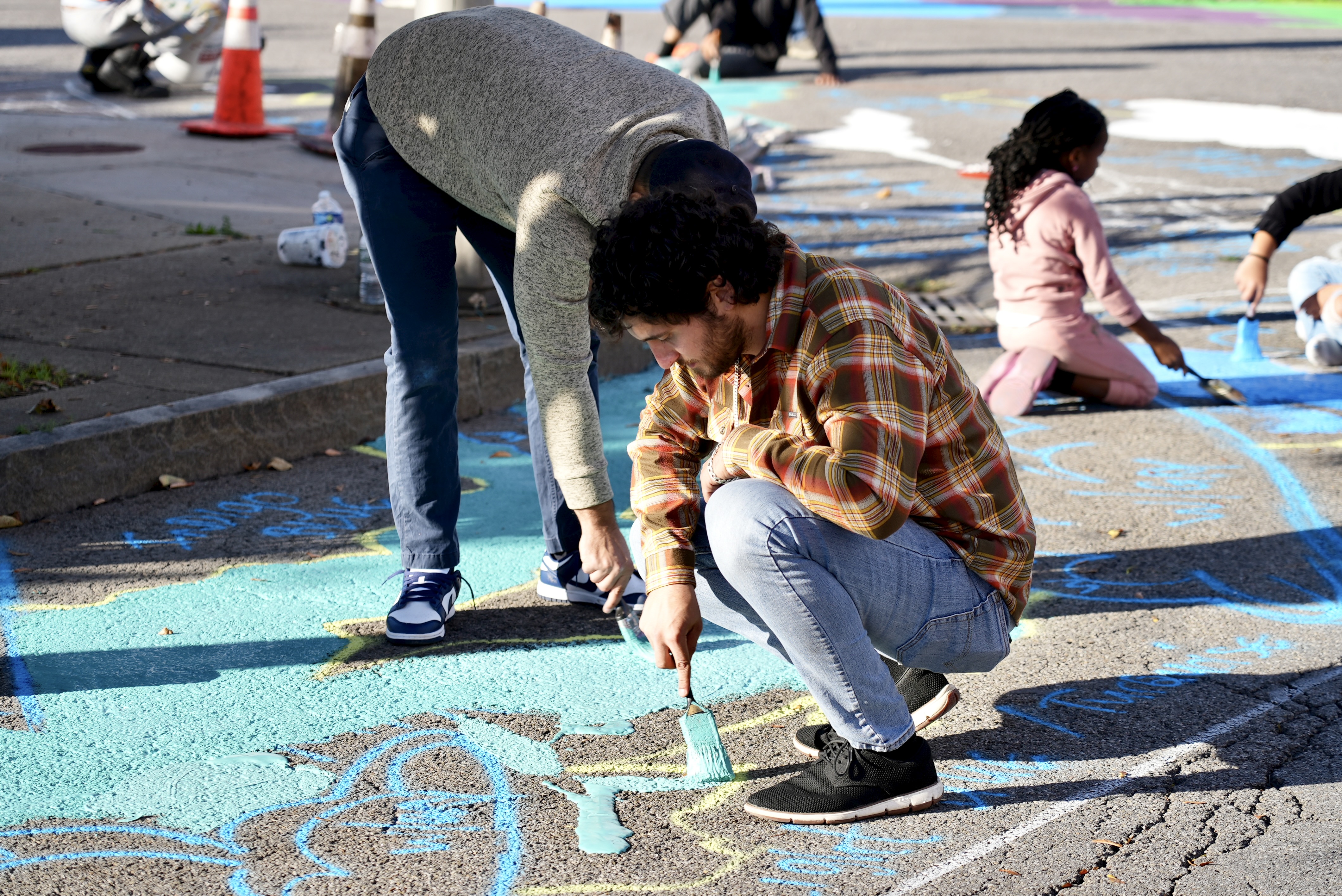 Asphalt Art before and after comparisons in Niagara Falls, NY.