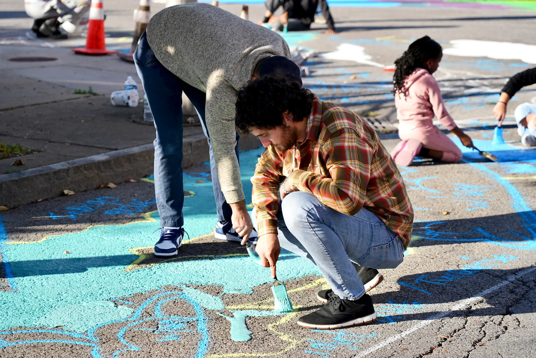 Asphalt Art before and after comparisons in Niagara Falls, NY.