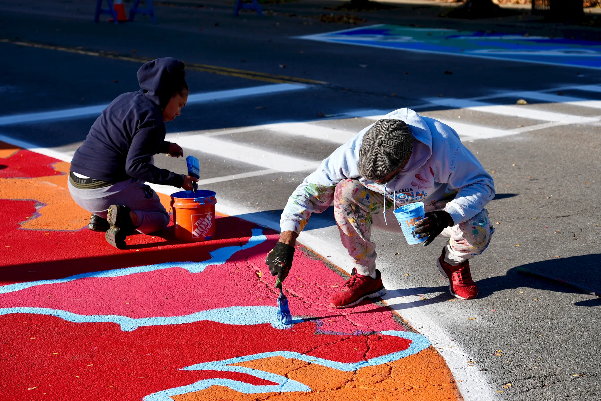 Asphalt Art before and after comparisons in Niagara Falls, NY.