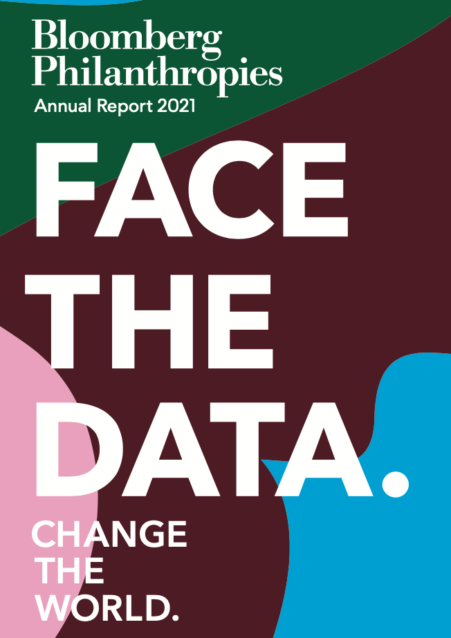 Annual Report cover image with large font saying "Face the Data. Change the World" and colorful blobs of color in the background