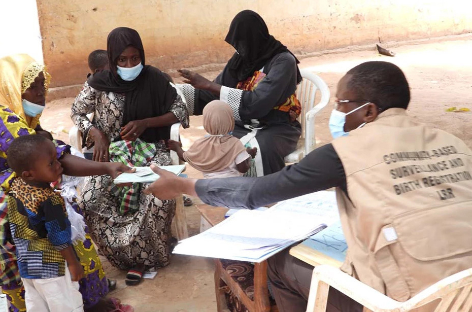 Community health volunteers facilitate birth and death registration in rural Gambia after receiving a grant from the Data for Health program. Credit: Vital Strategies