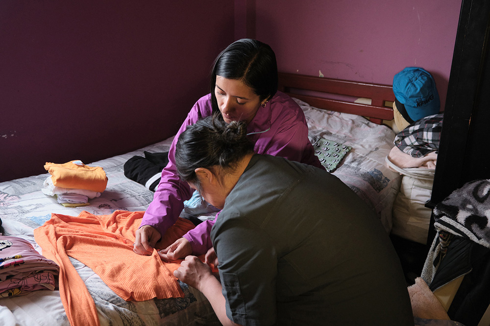 Woman receives assistance at a support center designed to reduce the burden of unpaid caregiving.