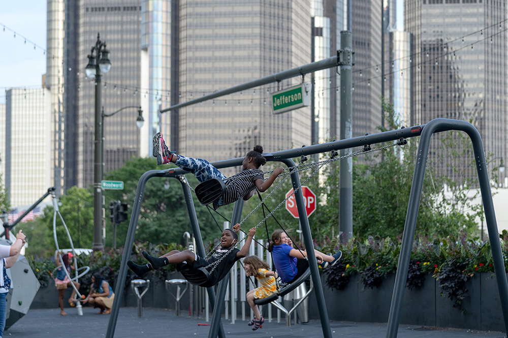 Community members gather at Spirit Plaza in Detroit, a public space revitalized through Bloomberg Associates’ support.