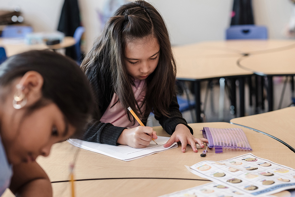 Students at Central Queens Academy Charter School engage in Summer Boost activities to improve math and reading skills.