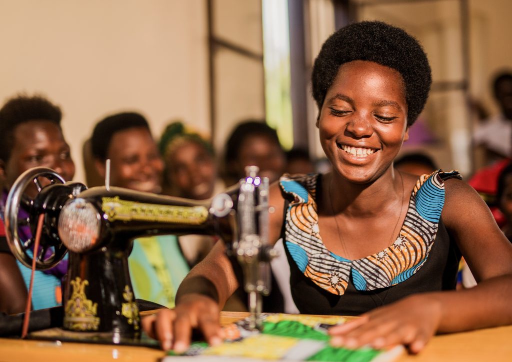 Women in Rwanda receive training in income-generating skills like textile making at the Women’s Opportunity Center. Credit: Serrah Galos