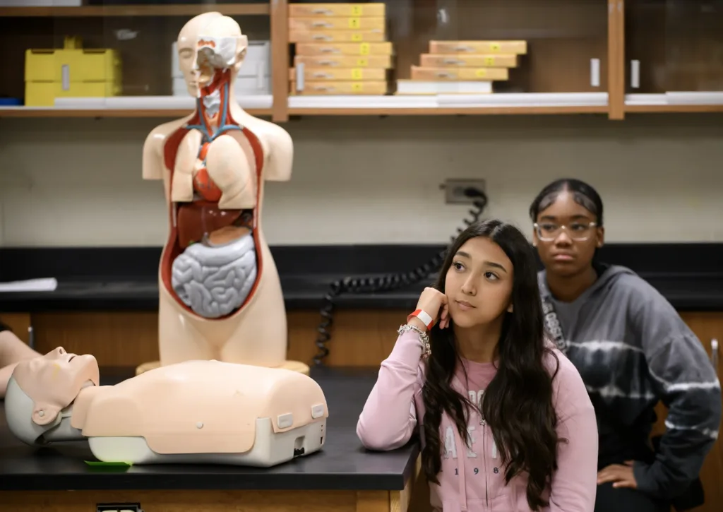 Students at HEAL High School in Houston participate in clinical training as part of their healthcare curriculum.