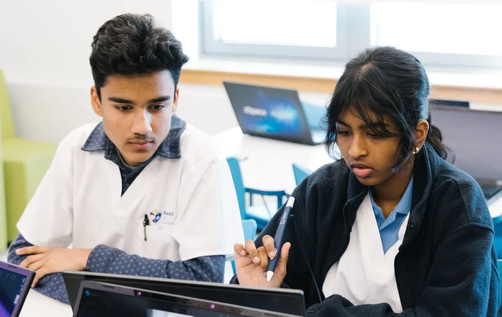 High school students collaborate on classwork at the Northwell School of Health Sciences in Queens, New York.