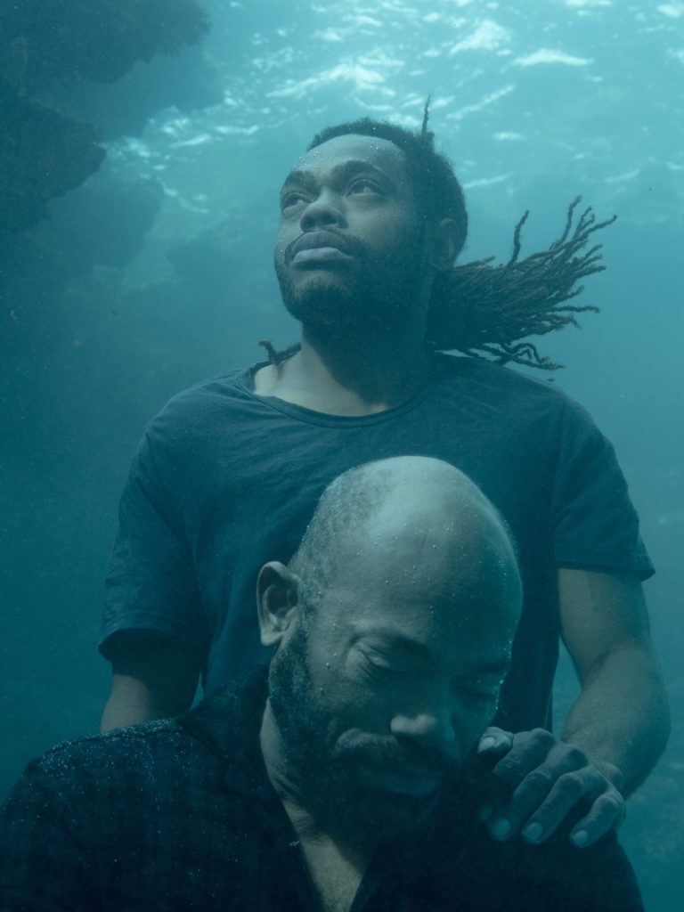 Man and father underwater