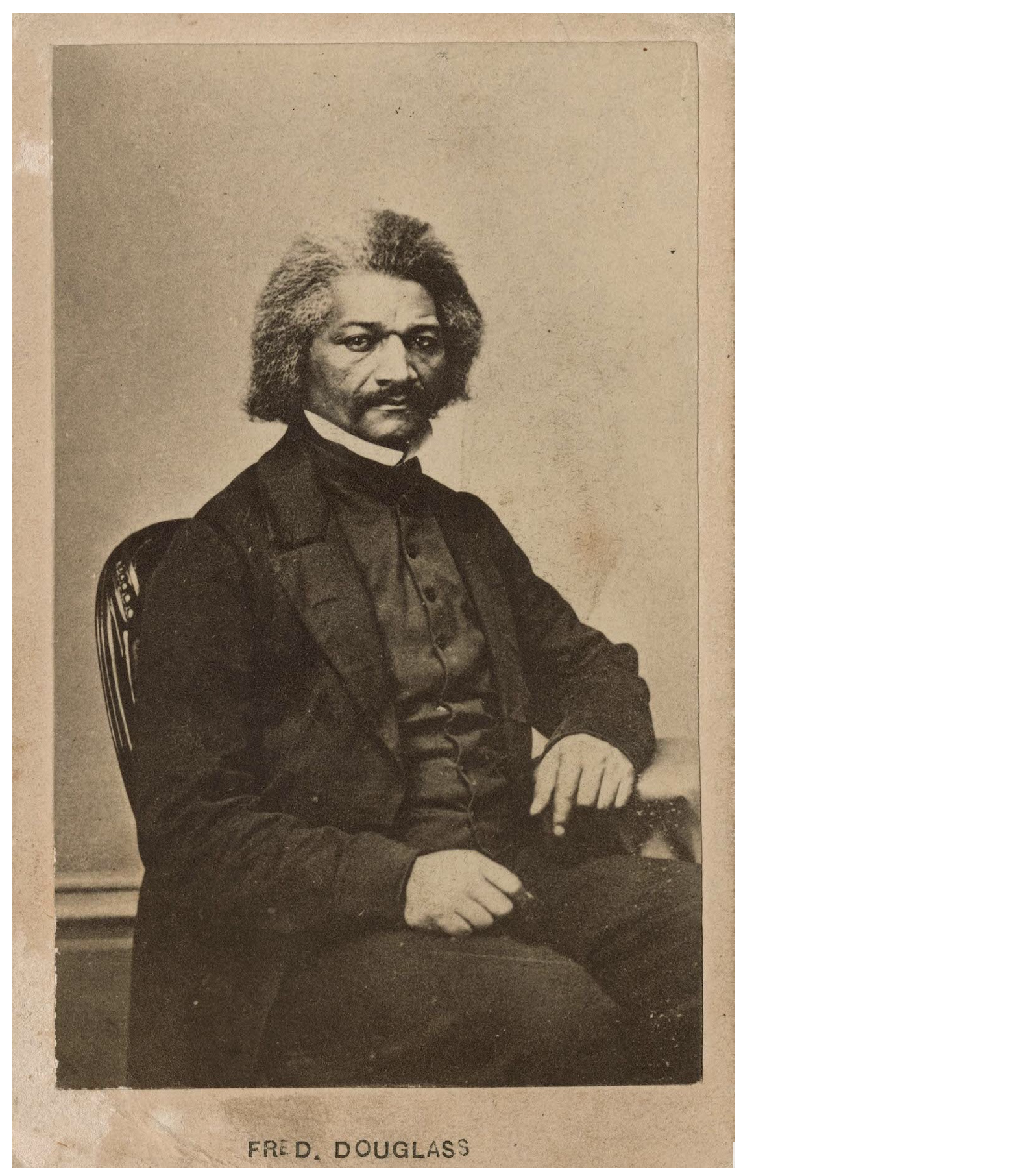 Sepia photo portrait of Frederick Douglass, seated