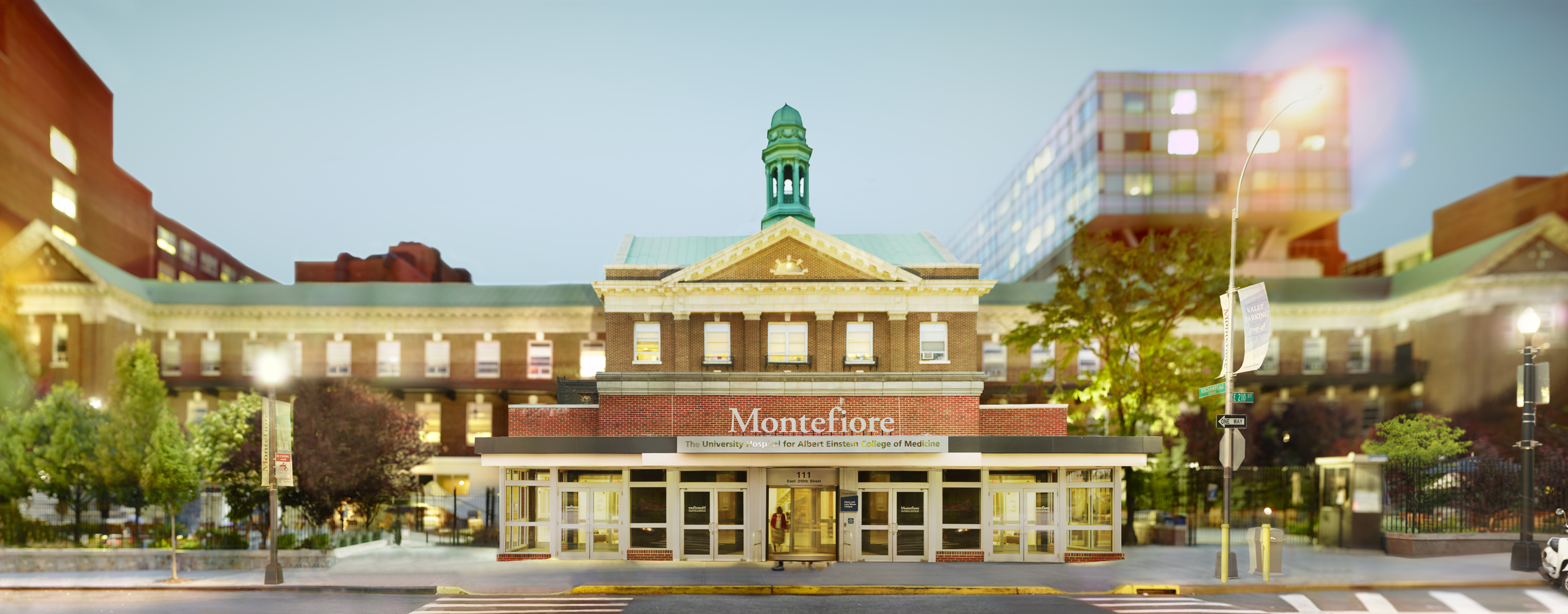 Composite image of entrance to main hospital. Facade of Montefiore Moses Campus by photographer Jeff Liao