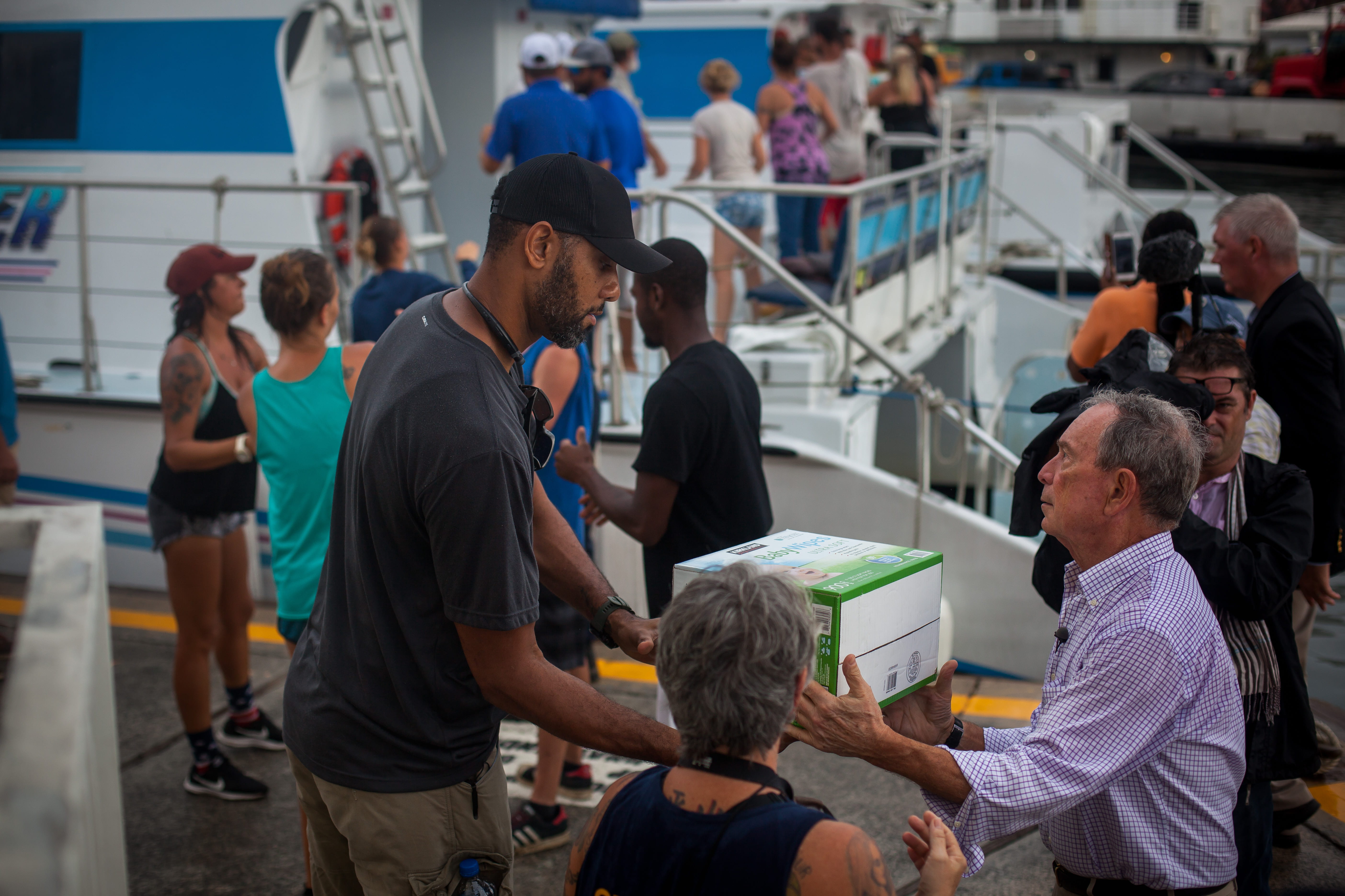 Mike Bloomberg and NBA all-star and U.S. Virgin Island native Tim Duncan deliver supplies to local communities in the U.S. Virgin Islands following Hurricanes Maria and Irma.