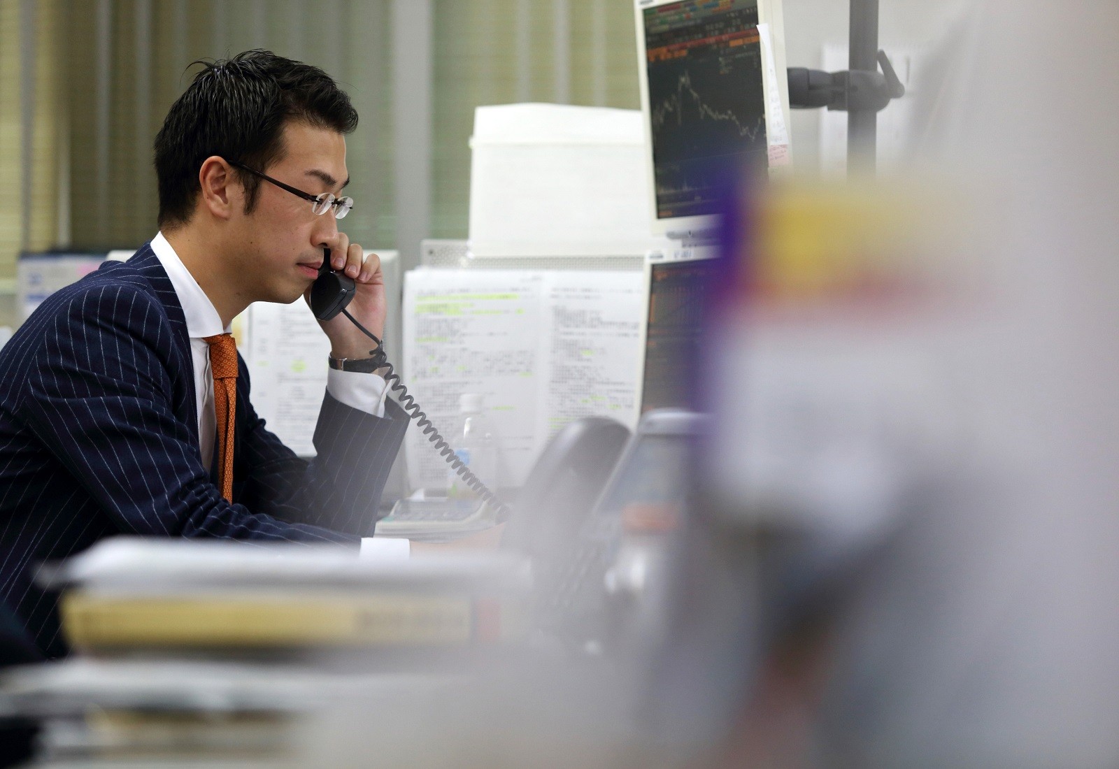 Train-Hopping Nomura Broker Chases New Appetite For Japan Stocks