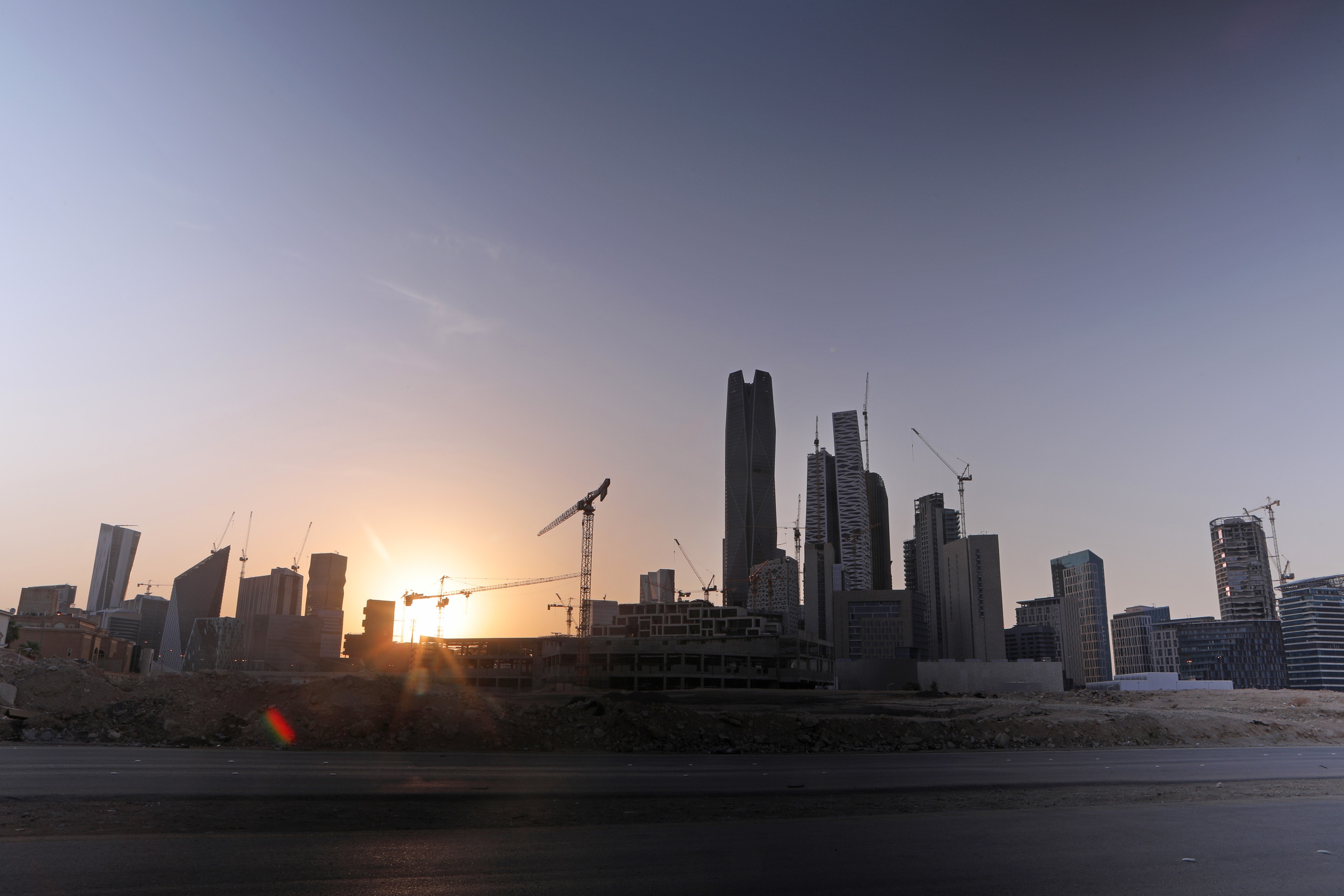 Sunset over buildings at the King Abdullah Financial District in Riyadh, Saudi Arabia