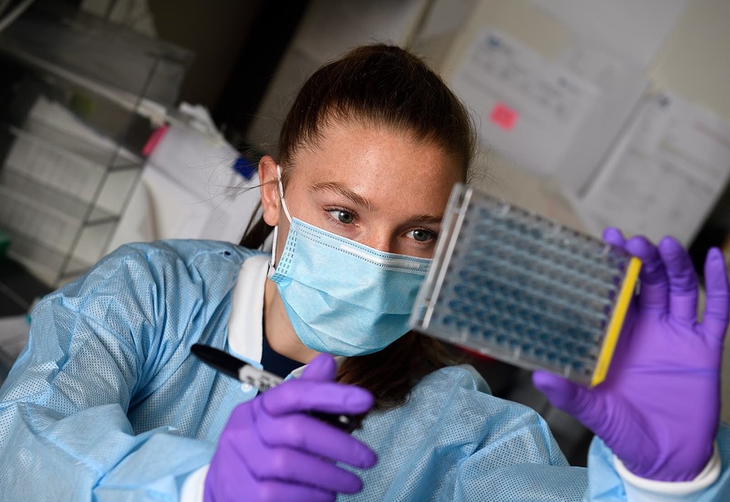 Johns Hopkins University 2020 COVID-19 Research Technologist Kirsten Littlefield conducts research in the lab of Dr. Andy Pekosz at the Bloomberg School of Public Health.