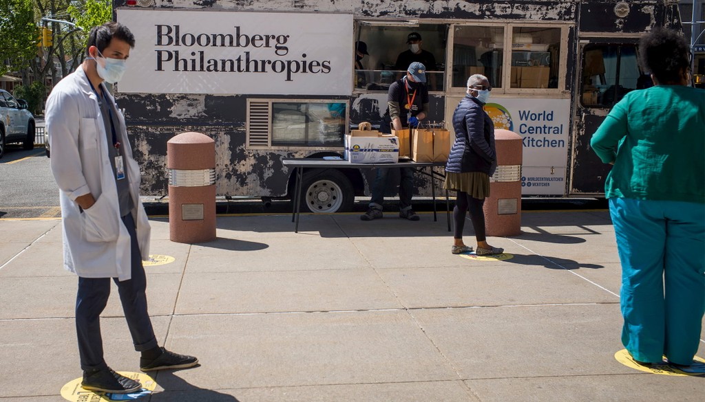 During the COVID-19 pandemic, World Central Kitchen and Bloomberg Philanthropies have teamed up to feed hospital staff at Kings County Hospital in Brooklyn. Doctors and nurses line up at food trucks to take bags of meals to their coworkers inside the hospital.